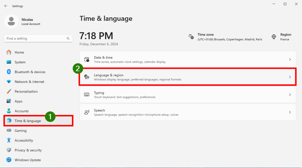 Paramètres > Time & Language > Language & region.